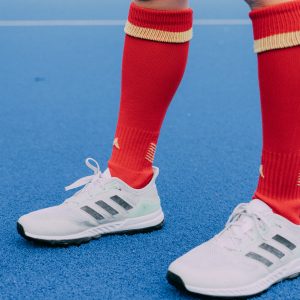 Medias de jugar a hockey hierba de color rojo. Son la primera equipación oficial de los redsticks
